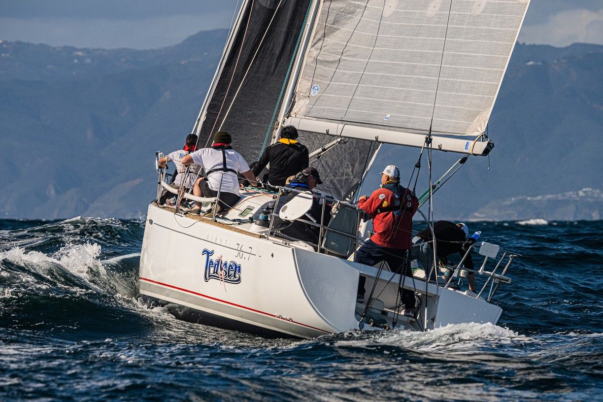 Crew hiking out on the First 36.7 Teaser in rough water off Palos Verdes